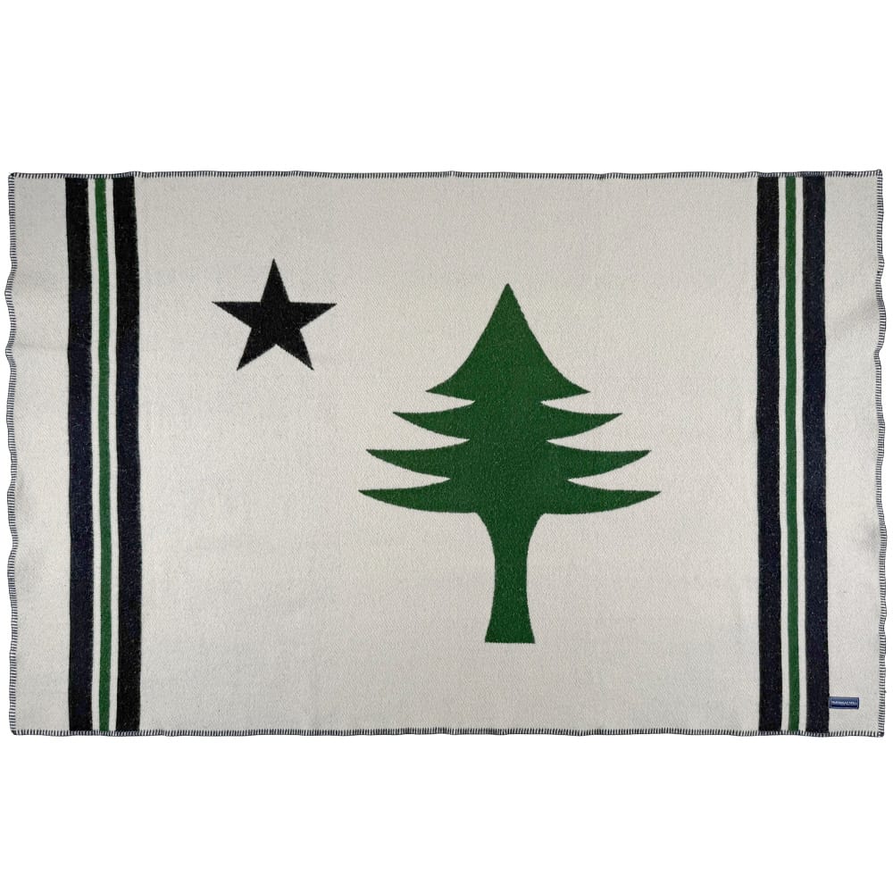 Unfolded image of the front of the Maine Flag Wool Throw shown in a top down view.
