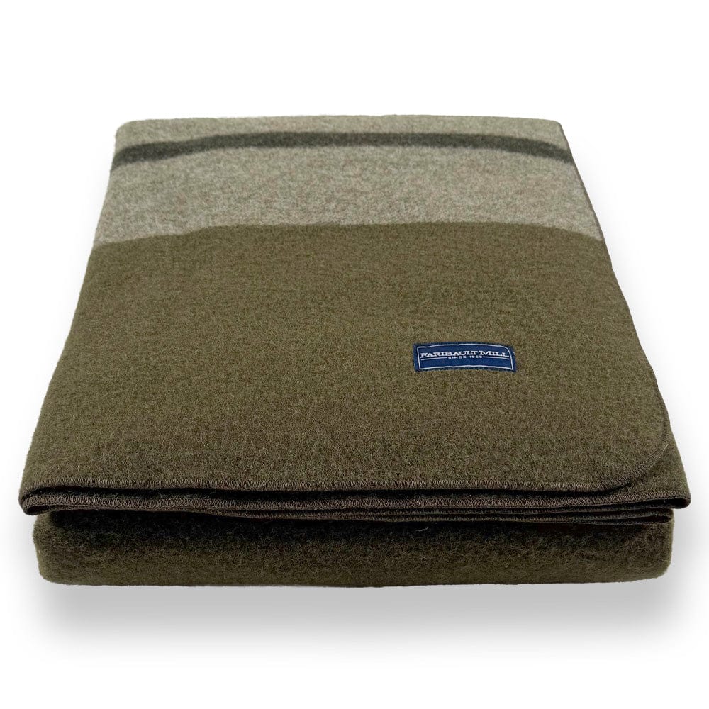 Faribault Mill Scout moss green middleweight wool bed blanket, folded and displayed from the front showing the weave and texture.