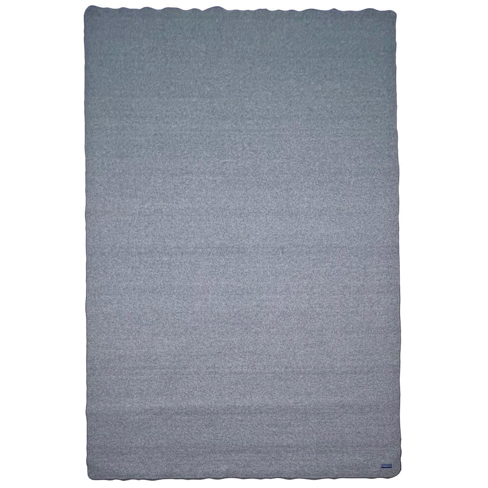 Faribault Mill Summit navy heavyweight wool bed blanket, unfolded and laid flat in a top-down view.